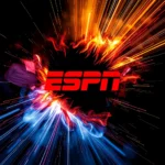 ESPN-Logo vor einem Hintergrund aus leuchtenden roten und blauen Strahlen und Wirbeln, mit einer Person in der Mitte, die eine Schweißermaske trägt und mit Schweißfunken arbeitet.